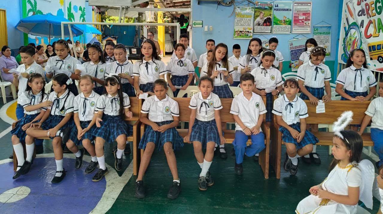 Students participating in an educational community gathering